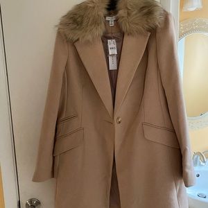 Topshop camel colored coat with fur collar.